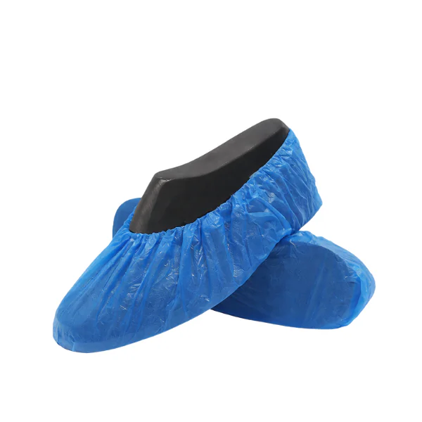 Blue disposable shoe covers for hygiene protection by Imaxclean Kuwait - non-slip waterproof footwear protection